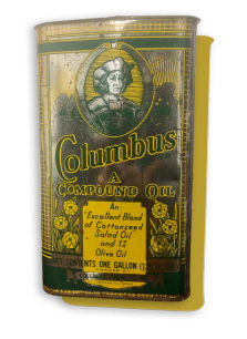 An antique oil can with the text, "Columbus a compound oils. An excellent blend of cottonseed salad il and 1% olive oil."